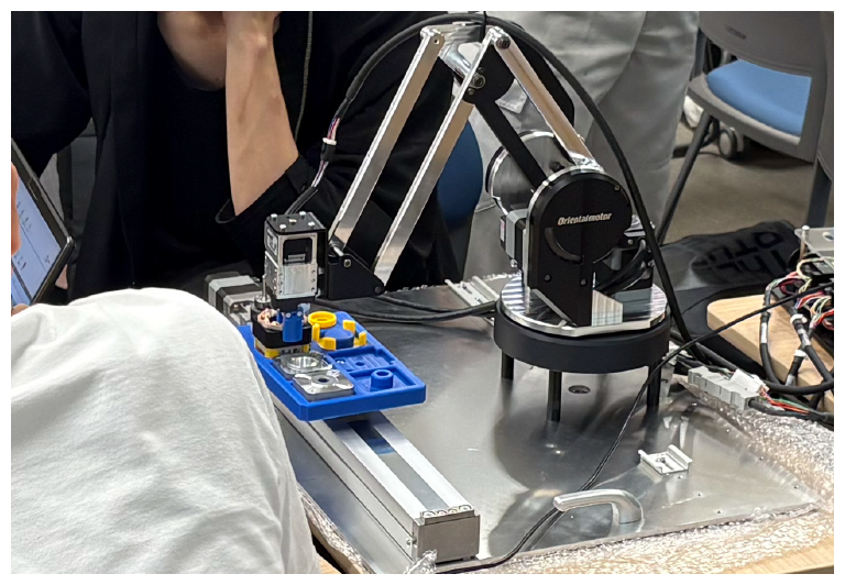 Learning scene with hands-on practice using an industrial training robot