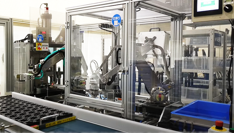 Production equipment integrated with the compact OVR robot to automate the component machining process for higher productivity and efficient industrial automation.